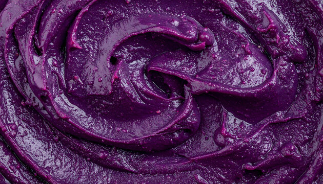 Dark purple blueberry jam or puree swirl texture macro top view