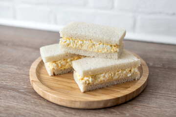 Tamago Sando sandwich on wooden table