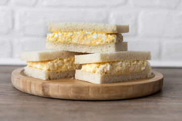 Tamago Sando sandwich on wooden table
