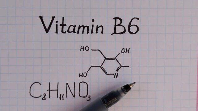 Chemical formula of Vitamin B6 with black pen.