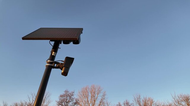 Flock camera with solar panel providing surveillance in Monroe County, Michigan, USA