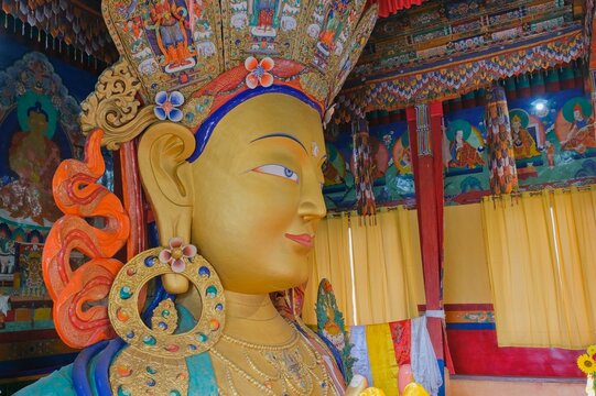 Statue of Maitreya, Future Buddha, inside Hemis Monastery ,Hemis Gompa, Tibetan Buddhist monastery. Ornate interior with traditional murals, columns and sacred Buddhist art.