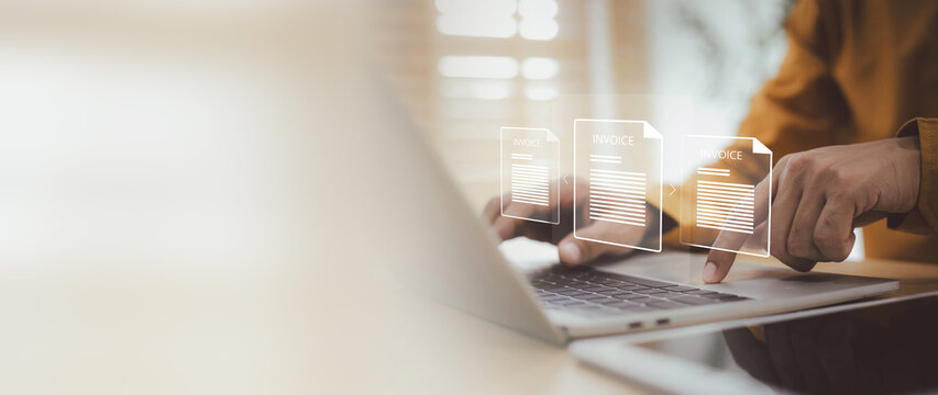 Digital invoice management and processing concept.  person uses laptop to successive digital invoice documents, symbolizing efficient workflow and automation in finance and business operations