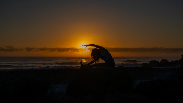 Sunrise yoga at the beach