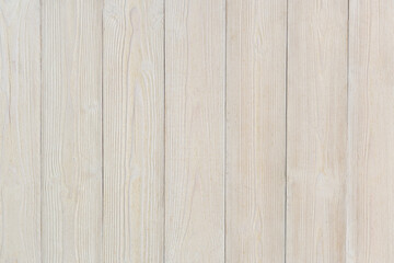 Naklejka premium Light whitewashed wooden plank background with natural wood grain texture. Clean vertical wood boards forming a neutral and minimal surface with copy space. Suitable for backgrounds, mockups, product 