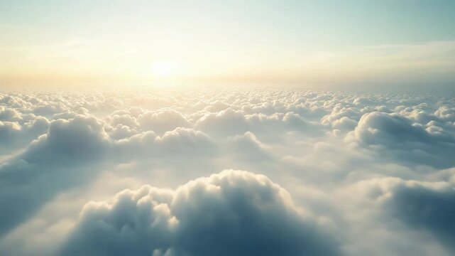 Endless white clouds stretching towards the horizon, illuminated by the bright morning sun creating a serene and ethereal cloudscape from an aerial perspective