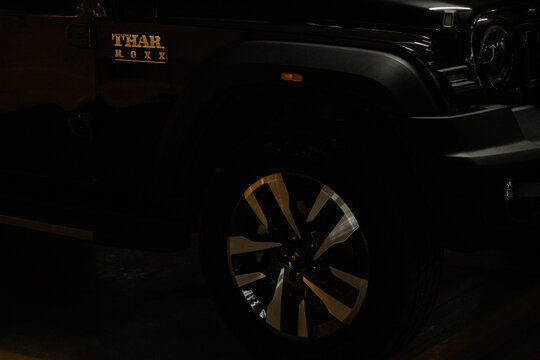 Thar Roxx car. Mahindra Thar Roxx is a rugged SUV. Available in various colors.  Mahindra and Mahindra (M&M) is an Indian automobile manufacturing company.