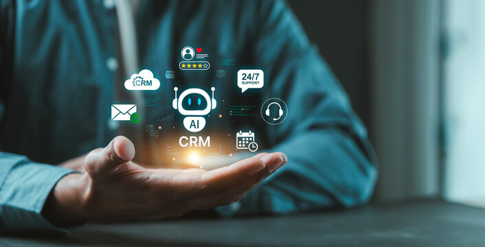 Businessman hand holding virtual AI robot with CRM customer relationship management automation technology concept, Communication Network, Digital transformation, Corporate strategy, User experience