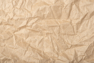Fototapeta premium The texture of crumpled craft paper