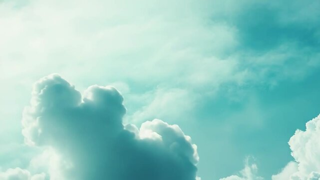 Aqua blue sky filled with soft, fluffy cumulus clouds forming a serene, airy backdrop with ample copy space for design, header or editorial use, bright and peaceful ambiance