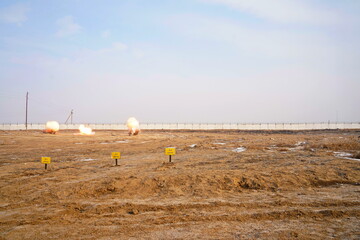 Naklejka premium Detonation of a mined field. Military exercises.