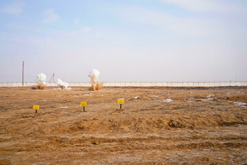 Naklejka premium Detonation of a mined field. Military exercises.
