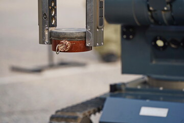 Naklejka premium A minesweeper robot for mine clearance. Military exercises.