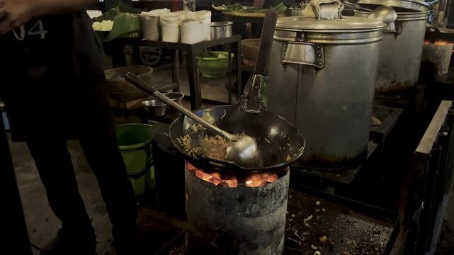 Chef Preparing Traditional Bakmi Jogja at Night Food Stall