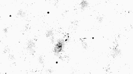 Fototapeta premium Abstract black and white speckled pattern with scattered dots