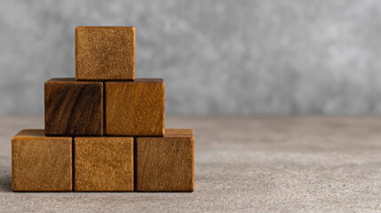 Strategic Scaling Structure Illustrated by Six Brown Wooden Blocks Arranged in Pyramid Stack on Grey Stone Surface Optimization Concept Optimizing Growth Layers