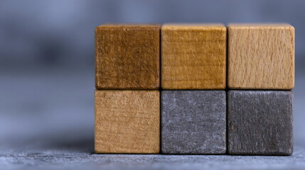 Strategic Scaling Structure Illustrated by Six Textured Wooden and Stone Blocks Arranged in Two Rows on Grey Surface Optimization Concept Purposeful Structural Design