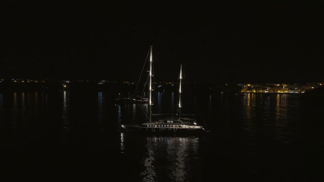 Yacht Moored In Bay In Evening Light, Procida, Italy - Drone Shot