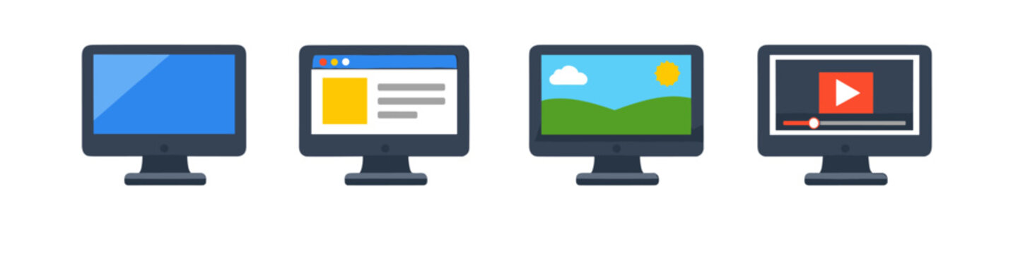 Four computer monitors displaying different content, from blank to video playback