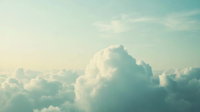 Fluffy cumulus clouds stretching endlessly under a gradient sky in soft pastel tones, creating a tranquil and ethereal landscape from an aerial perspective