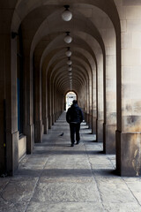 Two Walkers Under The Arches