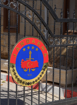 Side, Turkey - October 17, 2024. Official emblem of the Jandarma General Command,Turkish Gendarmerie, on iron gate in Turkey, representing the country's armed law enforcement organization