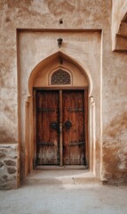 Fototapeta premium Rustic wooden door in ancient Middle Eastern architecture