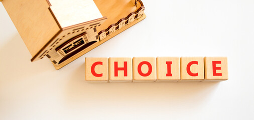 Choice symbol. Concept word Choice on beautiful wooden blocks. Beautiful white background....