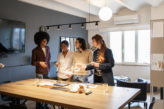 Diverse team collaborating in modern office