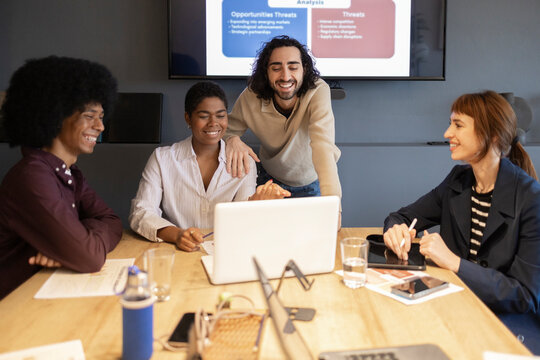 Collaborative diverse team working in modern office
