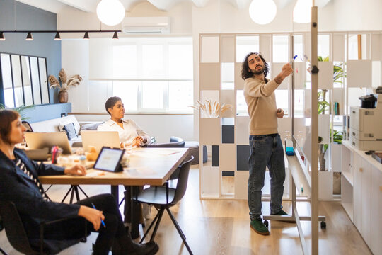Diverse team collaborating in a modern office