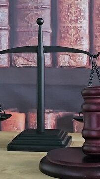 Understanding the balance in justice with a gavel and scales of law during a legal discussion
