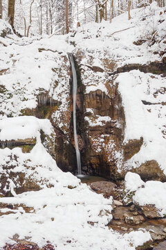 Waterfall flowing through the Gleiersch Gorge near Scharnitz in the Austrian Alps.