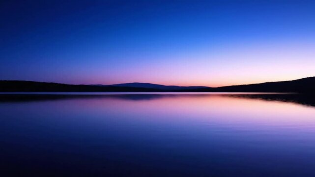 Tranquil Twilight Waters Show the serene, still water absorbing the indirect light of blue hour, generating a smooth, natural color gradient across its surface.