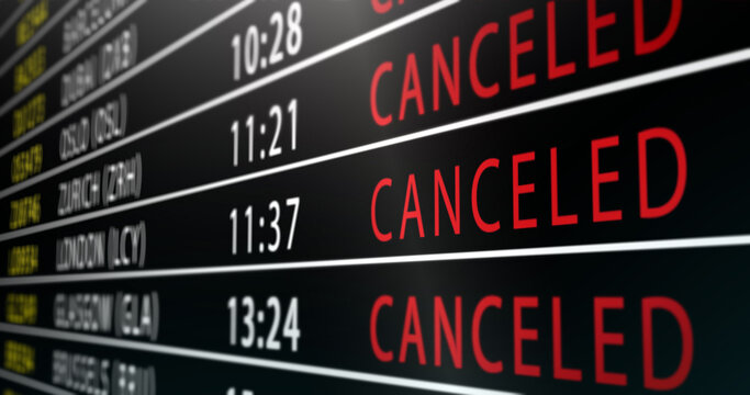 Large airport arrivals board displaying multiple international flights marked as cancelled, red warning text dominating the screen, symbolizing travel disruption, crisis, and global transport issues.