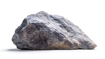 Obraz premium A large gray rock (boulder) on a white surface. Concept Large gray boulder, minimalist rock photography, textured surface, white backdrop, high-contrast still life