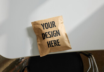 Mockup Of Vertical Customizable Paper Mailer Bag