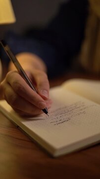 Writing on the notebook and scribbling