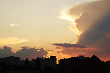 Fototapeta premium Sunset sky over city silhouette