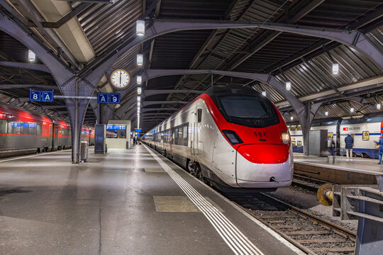 Zurich, Switzerland - November 09. 2025: Trains waiting for departure at the Zurich Main Railway station. Zurich HB (Main Railway Station) is the largest transportation junction in Switzerland