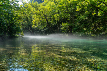 Fototapeta premium Rafting Adventure on the Voidomatis River – Scenic Waterways and Epic Nature in Greece