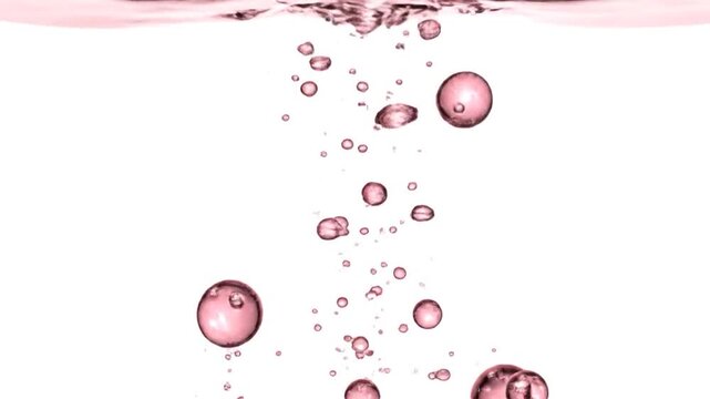 Pink bubbles rising and falling in a liquid, against a white background, creating a visual flow