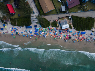 Top View Aerial of Colorful Beach Umbrellas and Waves in Garopaba, Brazil