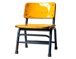 A well-worn, vintage yellow chair with a metal frame on a black background