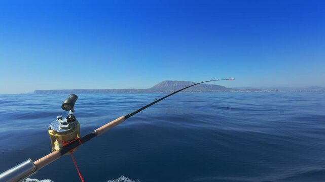Denia and Javea Costa Blanca trolling fishing rods on boat in Mediterranean Sea