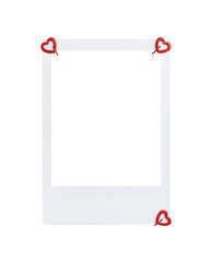 Blank photo frame held by four red heart clips