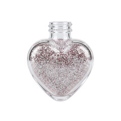 Clear glass heart-shaped bottle filled with pink glitter