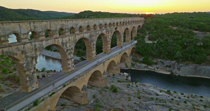 Aerial view of Pont du Gard, ancient Roman aqueduct on Gardon River. Tourist attraction of France