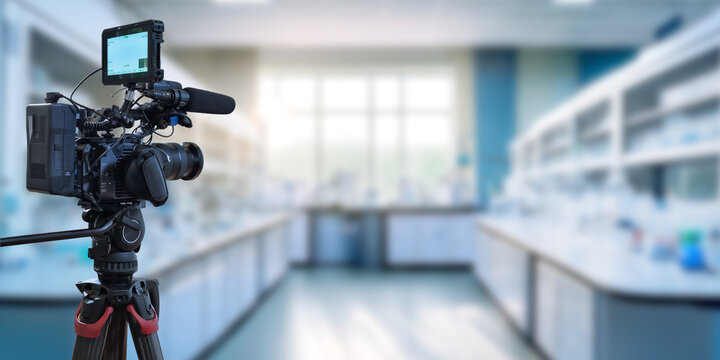 video camera with scientist research laboratory background
