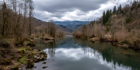 Obraz premium Doubs river valley with jura mountains reflection